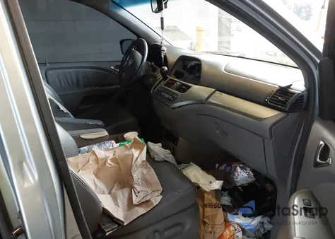 2010 Honda Odyssey Ex-L from USA, damaged, VIN 5FNRL3H70AB042009